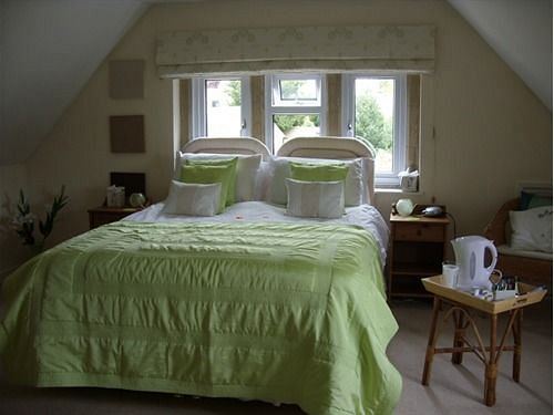 Double room with green bedding